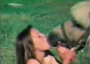 Cock-hungry slut is blowing a nice animal dick