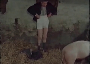 Old dirty zoophile fucks a cute farm animal in the doggy pose