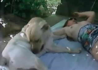 Busty naked slut want to play with her dog for a little