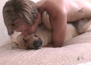 Filthy zoophile fucks a dog in the bedroom