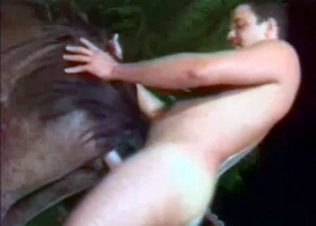 Muscled guy fucks a young horse