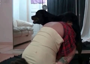 Tattooed schoogirl and her doggy