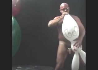 Old dude fucks a rabbit ballon or something